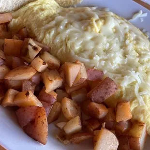 Veggie Omelette with potatoes in Breakfast menu