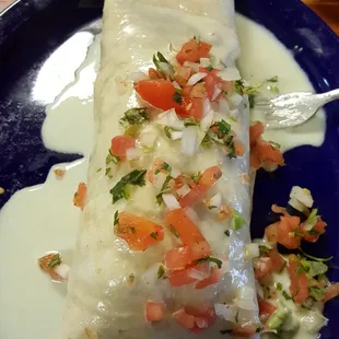 Giant burrito with chicken, rice and beans with mushrooms.  It had little rice and too much beans. Not a big fan.