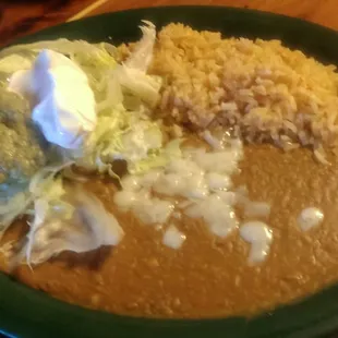 Beans and rice that come with dinner plate.