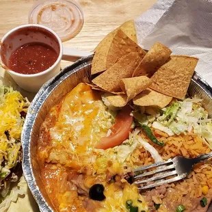 Cheese enchilada, hard shell chicken taco plate.