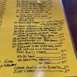 Handwritten menu with over 100 items