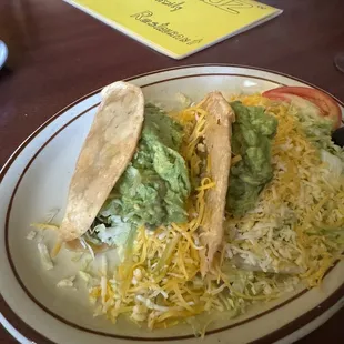 Two beef tacos w/guacamole al a carte