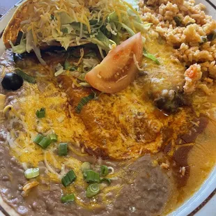 Taco, enchilada and chile relleno combo plate. Very good.