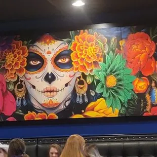 a group of people sitting in a restaurant