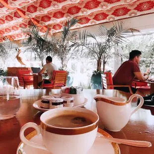 two cups of coffee on a table