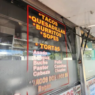 a menu on a food truck