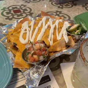 Nachos with sour cream on top