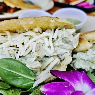 Reina Pepiada (chicken salad arepa)