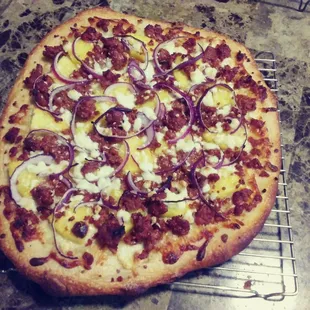 Chorizo, pineapple, onion and queso fresco made at home with house dough