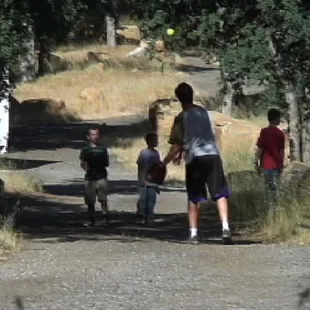 Kids playin' catch. Lotsa room