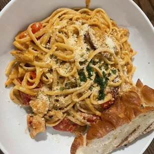 Creole chicken and sausage linguine (Blackened chicken, andouille sausage with roasted red pepper tossed in a spicy creole cream sauce)