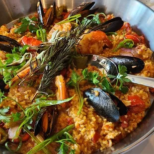 a bowl of seafood and rice