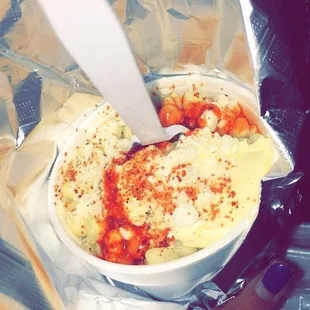 Corn in a cup with everything on top