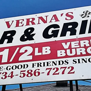 a sign for a bar and grill