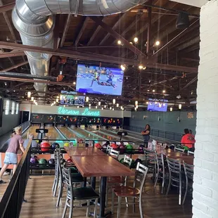 View of bowling lanes from the dining and bar area.