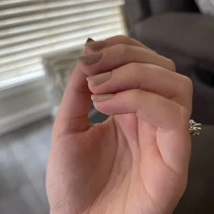 Sides of nails are very uneven. Like they dissent put even coats.