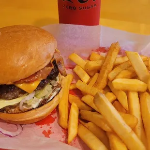 There bacon cheeseburger and fries