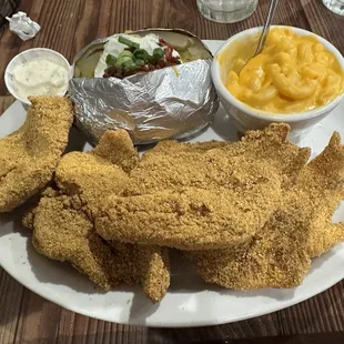 Fried catfish plate with mac-n-cheese and a loaded baked potato