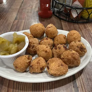 Complementary hush puppies, and a green tomato relish