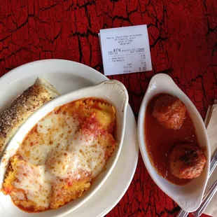 Cheese ravioli w/ breadstick and a side of meatballs. $8.92 The ravioli comes still actually boiling in the dish. EXTREMELY hot!