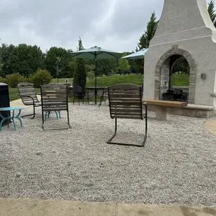 Some outside seating by the fireplace