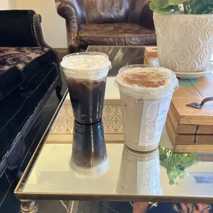 Vanilla cold brew with cold foam and cinnamon roll chai tea latte