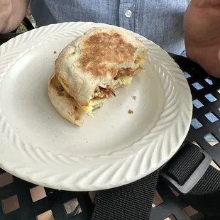 English muffin sandwich with bacon, egg, and cheese