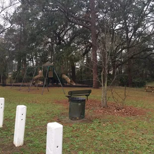 Playground, swing set, benches, and a picnic table. Very kid friendly.
