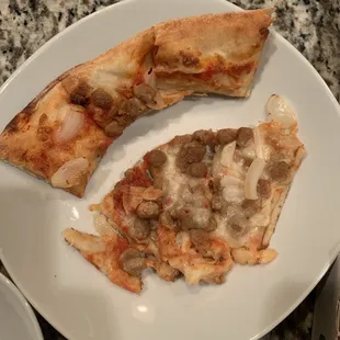 two slices of pizza on a plate