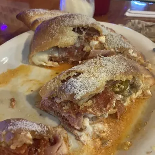 All meat Calzone with spicy marinara and jalapeños!