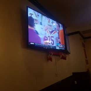 Nice tv set up to watch sports games.