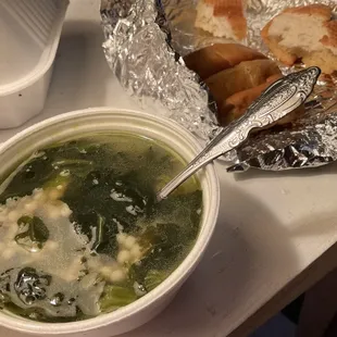 Wedding soup and garlic bread.