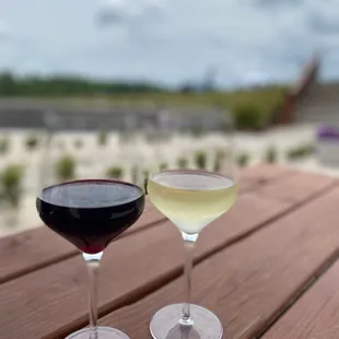 two glasses of wine on a table
