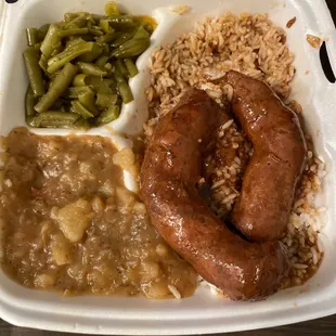 Fresh sausage, rice and gravy, green beans, smothered potatoes. All delicious