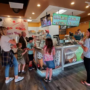 a group of people standing in line