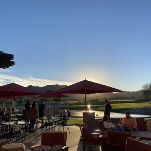 the sun setting over the patio