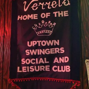 a banner hanging on a wall