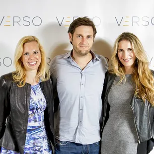 three people posing for a picture