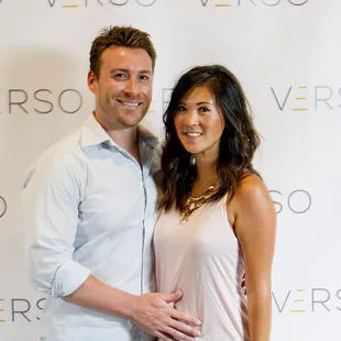 a man and a woman posing for a picture