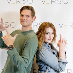 a man and a woman posing for a picture