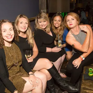 a group of women posing for a picture