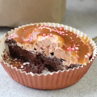 Inside of Ellen's Fine Goods GF chocolate cake with strawberry buttercream and tahini caramel ($8)
