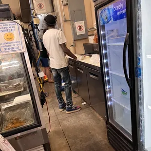Expo with no gloves on handling food.  He had absolutely no clue what was going on.