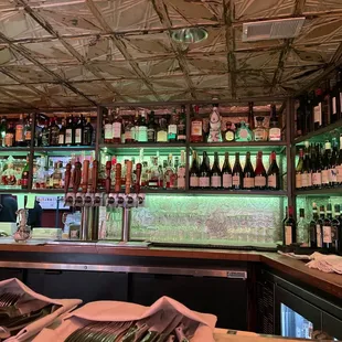 a man standing at a bar