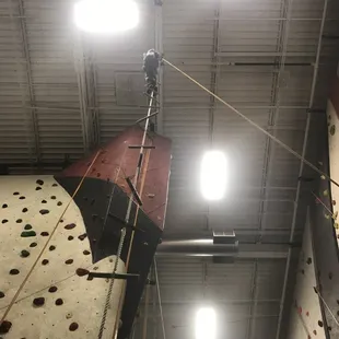 My 6 yr old taking on the rope ladder.