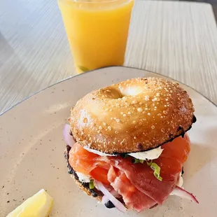 Salmon bagel with fresh orange juice...