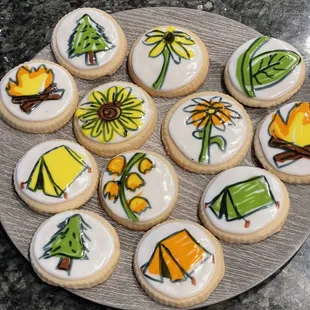 a plate of decorated cookies