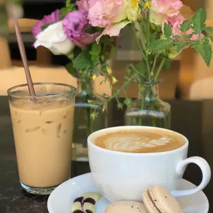 a cup of coffee and macaroons