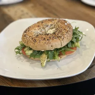 Everything bagel with avocado, tomato and lemon oil seasoning!