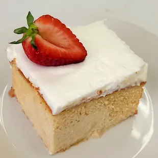 Tres Leches Cake  Soaked in three luscious milk and covered with a satiny white cream topping